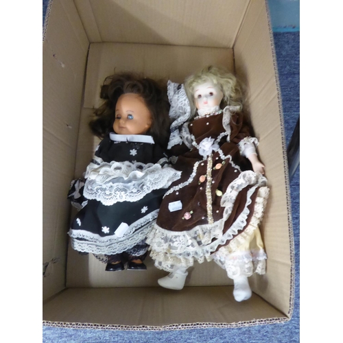 46 - TWO MODERN COSTUME DOLLS, ONE BISQUE, ONE HARD PLASTIC