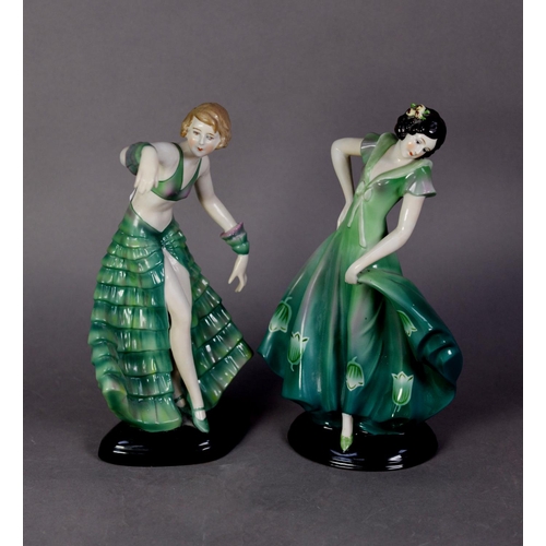 46 - TWO MODERN CONTINENTAL CHINA ART DECO STYLE FEMALE FIGURES, each modelled in a green dress and styli... 