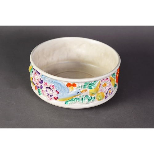 49 - CLARICE CLIFF NEWPORT POTTERY FRUIT BOWL, moulded and colourfully painted with two birds amongst fru... 