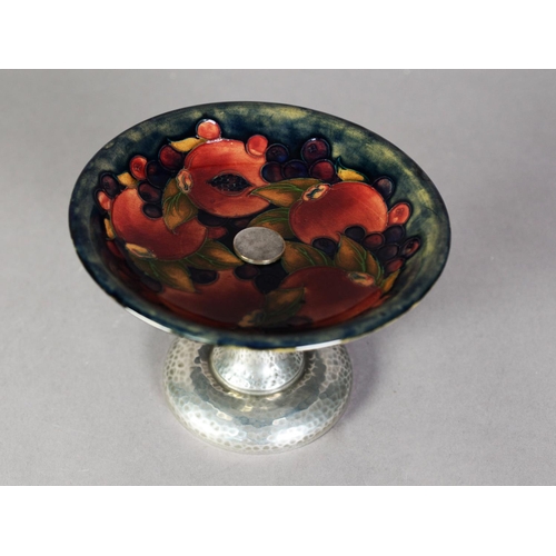 56 - INTER-WAR YEARS WILLIAM MOORCROFT POTTERY FRUIT STAND OR TAZZA WITH TUDRIC PLANISHED PEWTER PEDESTAL... 