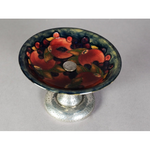 67 - INTER-WAR YEARS WILLIAM MOORCROFT POTTERY FRUIT STAND OR TAZZA WITH TUDRIC PLANISHED PEWTER PEDESTAL... 