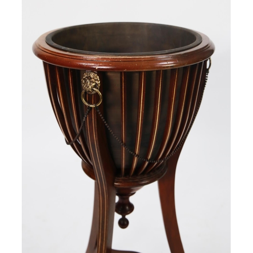 148 - EDWARD VII MAHOGANY BASKET PLANTER WITH COPPER LINER, lion mask roundels, and beadwork festoons, all... 