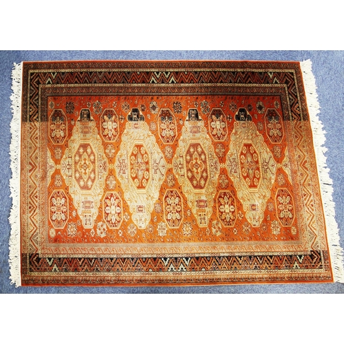 27 - PAKISTAN BOKHARA SMALL CARPET with a row of four large primary guls flanked by two rows of six small... 