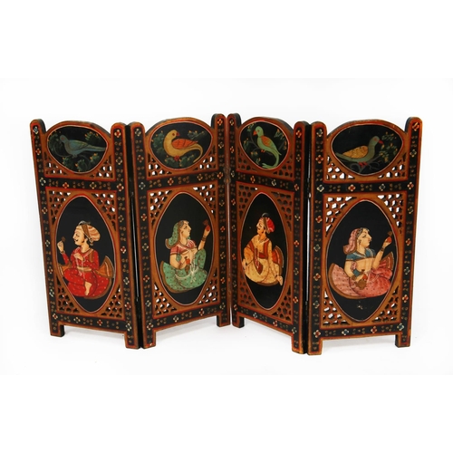 55 - PRE-WAR INDIAN PIERCED AND PAINTED DOUBLE-SIDED WOOD FOUR FOLD LOW SCREEN OR TABLE SCREEN, each side... 