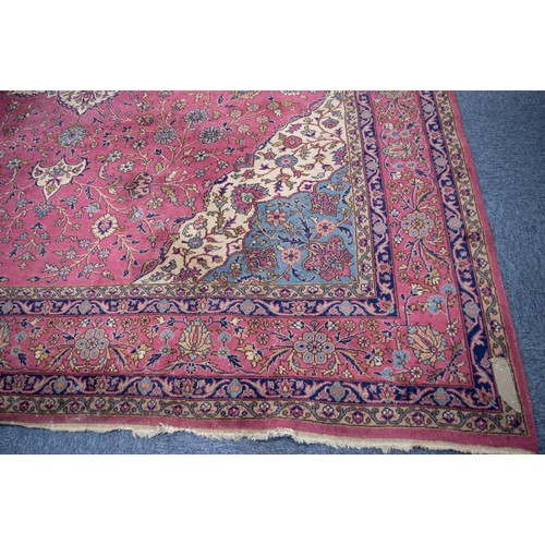 4 - SEMI-ANTIQUE KERMANSHAH LARGE PERSIAN CARPET with pale blue and ivory petal shaped centre medallion ... 