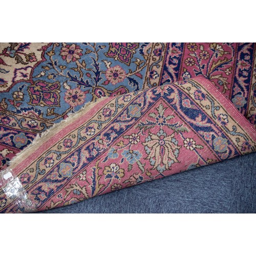 4 - SEMI-ANTIQUE KERMANSHAH LARGE PERSIAN CARPET with pale blue and ivory petal shaped centre medallion ... 