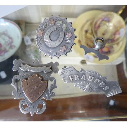 55 - 1894 SILVER AND GILT OVERLAID PRIZE SHIELD MEDALLION AND TWO SILVER BROOCHES, ONE LETTERED 'FRANCES'... 