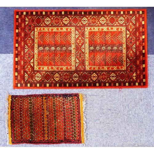19 - BELGIUM ROYAL KASHAN POWER LOOM WOVEN ALL-WOOL RUG, in Turkoman style with two rectangular panels, p... 