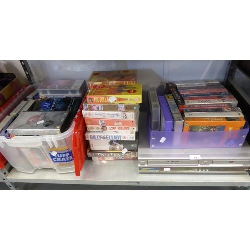 47 - A PANASONIC VIDEO AND DVD PLAYER AND A QUANTITY OF VIDEO CASSETTES