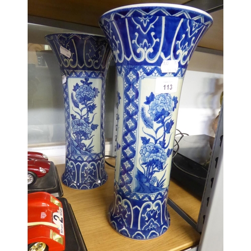 60 - A PAIR OF 20TH CENTURY CHINESE BLUE AND WHITE PORCELAIN CYLINDRICAL VASES WITH FLARED TOPS, PAINTED ... 