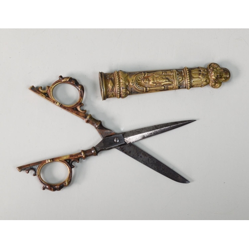 331 - PAIR NINETEENTH CENTURY PROBABLY CONTINENTAL cast brass handled STEEL SCISSORS contained in a cast b... 