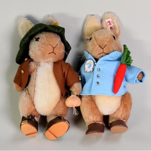 241 - TWO STEIFF MODEL RABBIT STUFFED TOYS: PETER RABBIT with cinnamon mohair and cotton fur, with button ... 