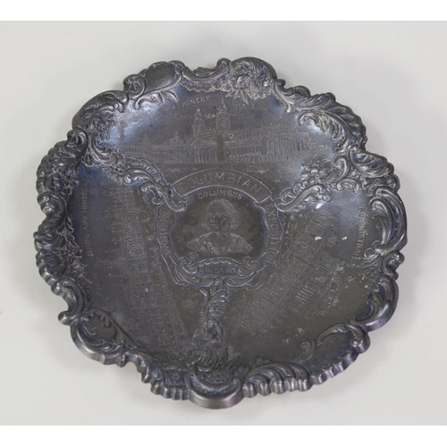 255 - WORLD'S COLUMBIAN EXHIBITION CHICAGO 1892, ROCOCO EMBOSSED PEWTER CIRCULAR DISH, centred with etched... 