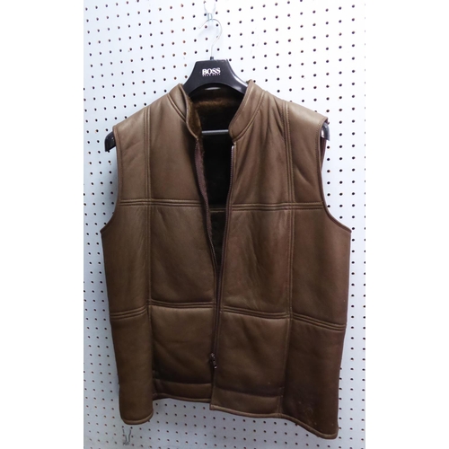 404 - HIDEPARK.CO.UK 'TOP GRADE HIDE' DARK BROWN GILET with various pockets, size XL; a SHEEPSKIN SHOP, LE... 