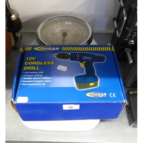 36 - A SET OF SALTERS PERSONAL WEIGH SCALES WITH LARGE CIRCULAR DIAL AND A COUGAR ELECTRIC CORDLESS DRILL... 