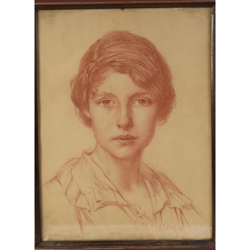 169 - EDWARD RIDLEY (1883 - 1946) RED CHALK DRAWING Portrait of a young woman, depicted full face 11 3/4in... 