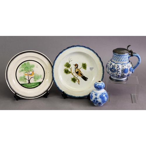 311 - TWO FAIENCE ORNOTHOLOGICAL PLATES, plus a cut-down double gourd vase and lidded melon shaped tankard... 