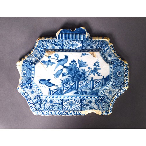 322 - 17TH CENTURY DUTCH DELFT WALL PLAQUE, c.1690, finished in the quail pattern within a diaper pattern ... 