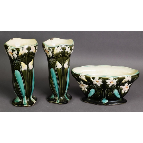 289 - ART NOUVEAU MOULDED POTTERY THREE PIECE VASE GARNITURE, comprising: LOW BOAT SHAPED RECEIVER and a P... 