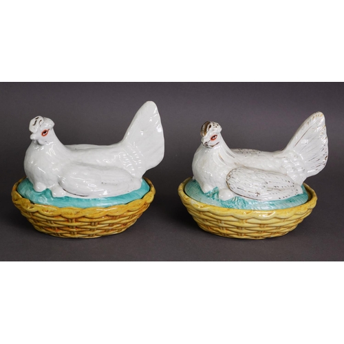 298 - PAIR OF ‘HEN ON NEST’ MOULDED POTTERY TUREENS AND COVERS, typically modelled and painted in colours ... 