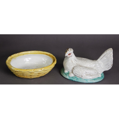 298 - PAIR OF ‘HEN ON NEST’ MOULDED POTTERY TUREENS AND COVERS, typically modelled and painted in colours ... 