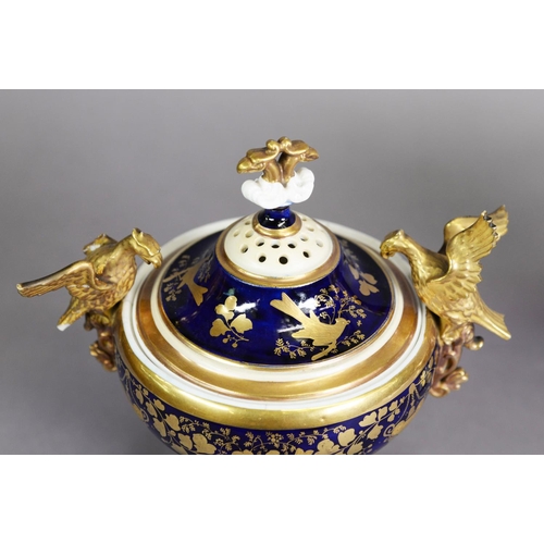 284 - THREE PIECE LATE NINETEENTH/ EARLY TWENTIETH CENTURY PORCELAIN GARNITURE OF TWO HANDLED PEDESTAL POT... 