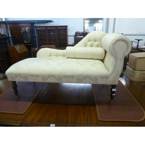 244 - SMALL VICTORIAN STYLE FULLY UPHOLSTERED CHAISE LONGUE on turned legs, 51