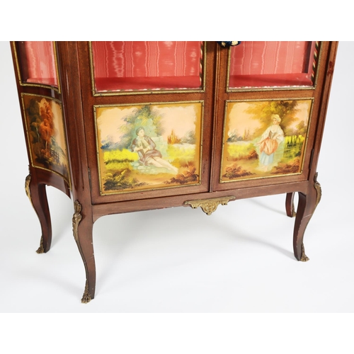 482 - LOUIS XVI STYLE MAHOGANY VITRINE, with glazed concave sides, two glazed doors, the four lower panels... 