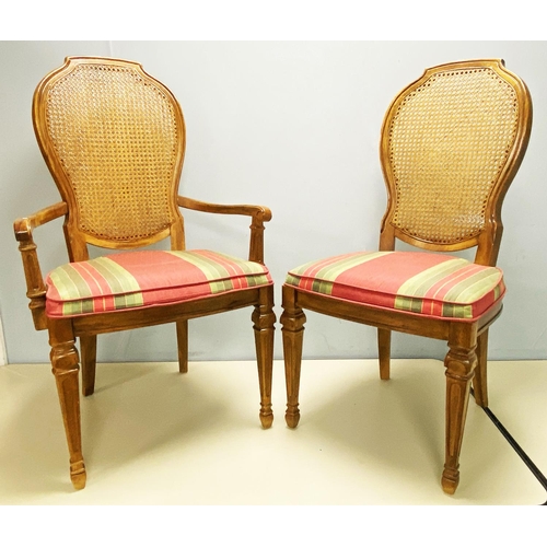 477 - A DINING ROOM SUITE OF TEN PIECES, comprising 8 chairs, including a pair of carver’s armchairs, with... 