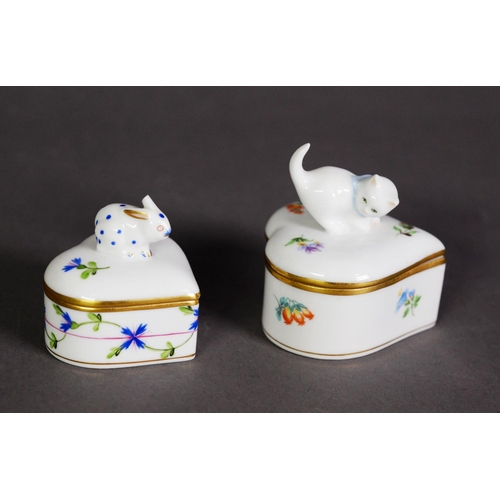 557 - TWO HEREND HUNGARIAN PORCELAIN HEART-SHAPED GRADUATED TRINKET BOXES, the lids with animal finials [2... 