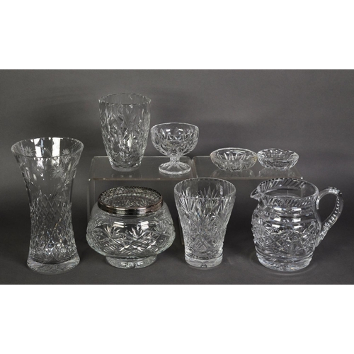 529 - A CUT GLASS BULBOUS ROSE BOWL, with metal grille; three cut glass flower vases; a heavy cut glass la... 