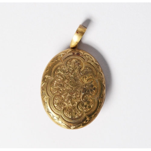 116 - VICTORIAN GOLD COLOURED METAL OVAL LOCKET PENDANT, the font applied with a blue enamelled star burst... 