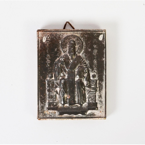 77 - GREEK STAMPED METAL RELIGIOUS ICON depicting an enthroned saint with halo and Greek inscription, 3in... 