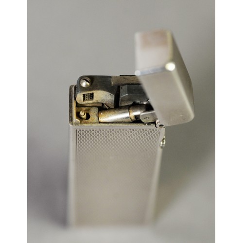 83 - DUNHILL 'ROLLAGAS' SWISS SILVER PLATED POCKET CIGARETTE LIGHTER, rectangular with engine turned deco... 