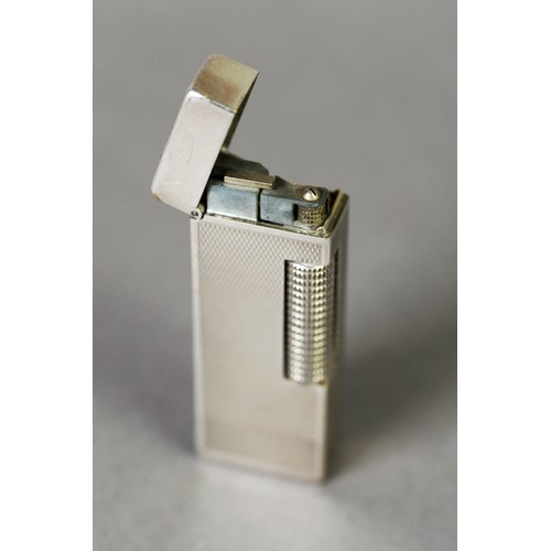 83 - DUNHILL 'ROLLAGAS' SWISS SILVER PLATED POCKET CIGARETTE LIGHTER, rectangular with engine turned deco... 