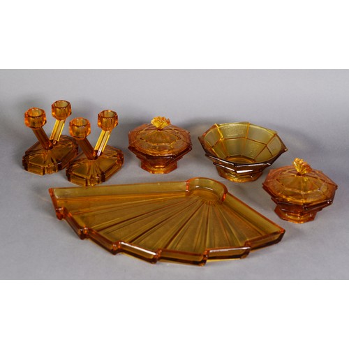 583A - AMBER GLASS ART DECO DRESSSING TABLE SET of 6 pieces, including a fan shaped tray and a pair of two-... 