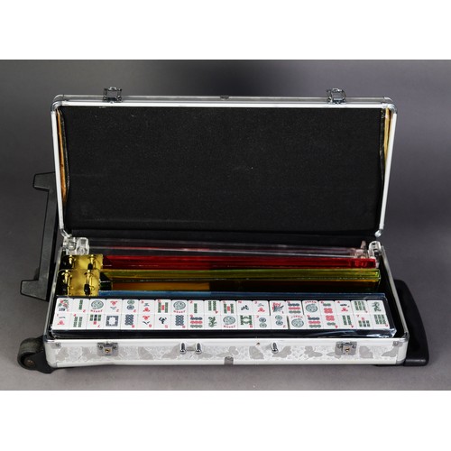 525B - MAH JONG SET with bone and bamboo pieces, racks, etc., contained in a modern metal wheeled travellin... 