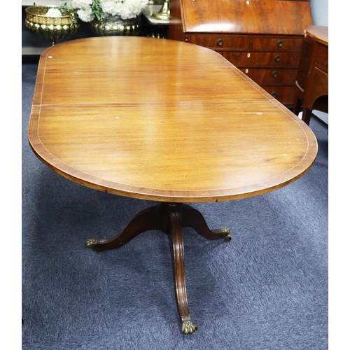 63 - REPRODUCTION MAHOGANY TWIN PILLAR DINING TABLE, WITH ADDITIONAL LEAF, AND SET OF EIGHT (6+2) TRAFALG... 