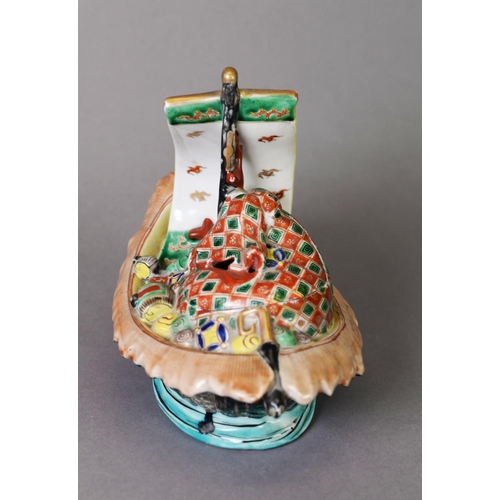 31 - HEAVILY POTTED JAPANESE PORCEALAIN POT-POURRI MODELLED AS A BOAT ON THE OCEAN, marked to the base; t... 