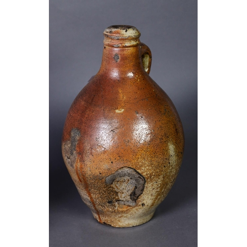 212 - LATE 18TH CENTURY SALT GLAZED STONEWARE FLAGON, similar to a bellarmine, together with a later earth... 