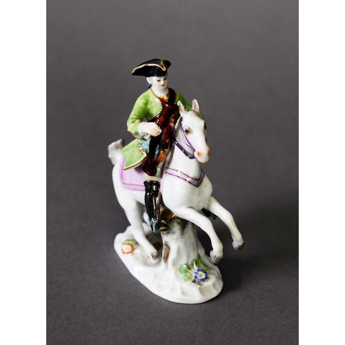 188 - 19TH CENTURY MEISSEN MINIATURE FIGURE, as a figure in tricorn hat mounted on rearing horse with blun... 