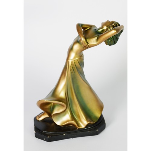 71 - GUISEPPE LEONARDI, ART DECO PAINTED PLASTER FEMALE FIGURE, in gold and green, modelled in stylised p... 