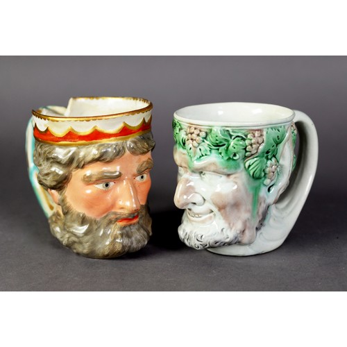 189 - WELL MODELLED NINETEENTH CENTURY MAJOLICA POTTERY BACCHANALIAN MASK OR CHARACTER JUG, together with ... 