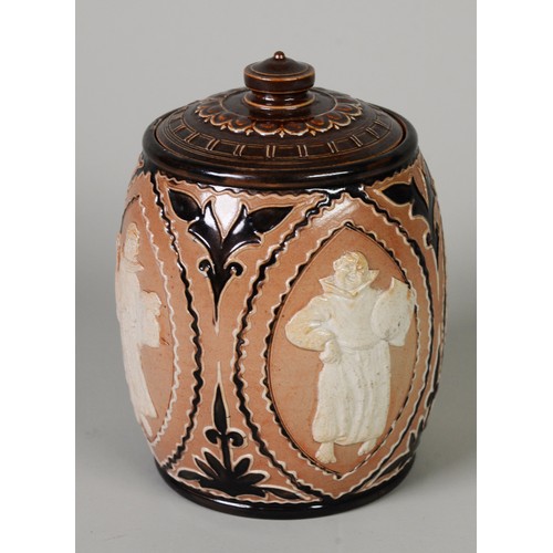 126A - DOULTON LAMBETH SALT GLAZED TOBACCO JAR AND COVER, having four applied cream navette shaped panels w... 