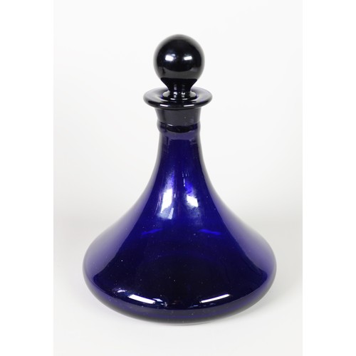 252 - BRISTOL BLUE GLASS SHIP'S DECANTER AND STOPPER, 25cm high