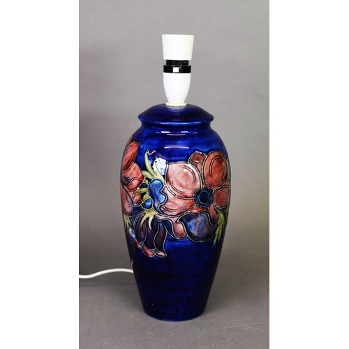 18 - Moorcroft pottery tall ovular vase table lamp, with large red flowers on a royal blue ground, 10 ½” ... 