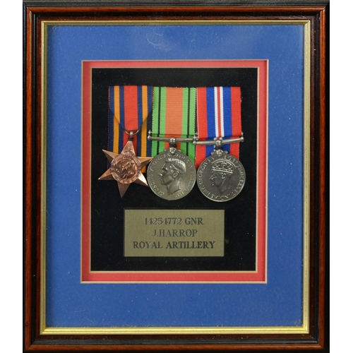 51 - THREE WORLD WAR II SERVICE MEDALS AWARDED TO 14254772 GNR J. HARROP ROYAL ARTILLERY, viz Burma Star,... 