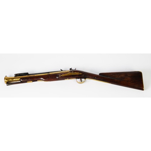 85 - LATE 18yh/EARLY 19th CENTURY FLINTLOCK COACHING BLUNDERBUSS with brass bell-ended 14in (35.5cm) barr... 