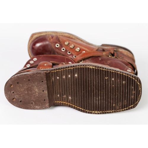 429 - PAIR DAOUST VINTAGE LEATHER SKI BOOTS with laceholes to the front and heel and leather straps, heavy... 