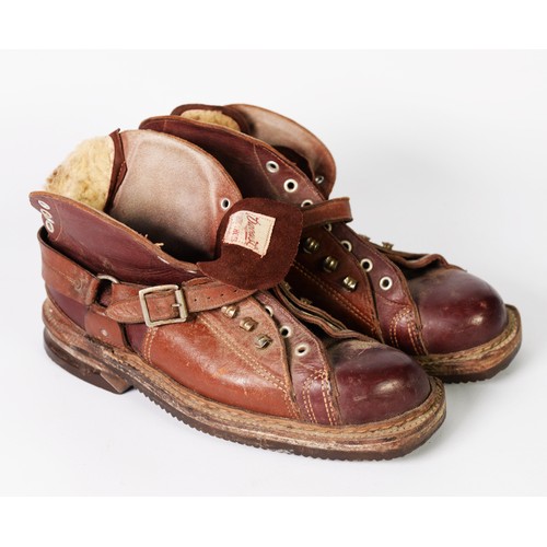 429 - PAIR DAOUST VINTAGE LEATHER SKI BOOTS with laceholes to the front and heel and leather straps, heavy... 